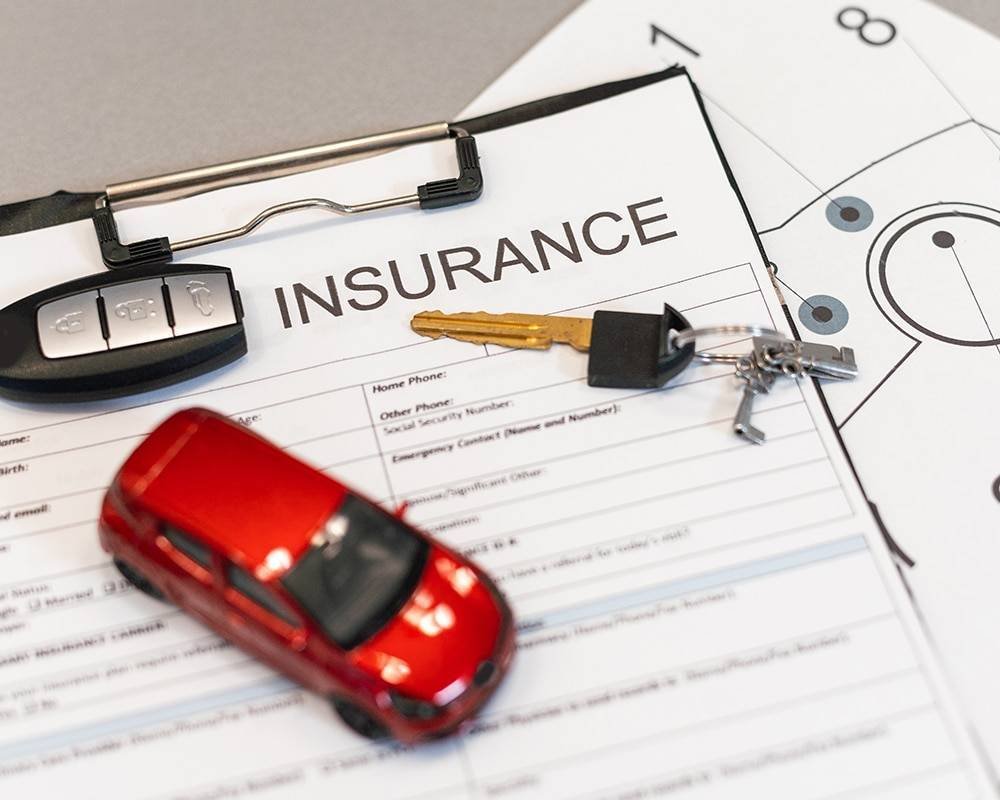 Modern car on the road representing auto insurance coverage
